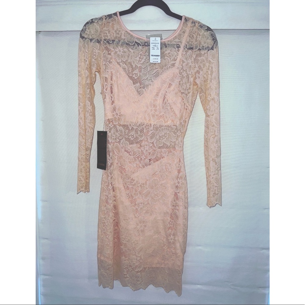 BeBe lace fitted midi dress. Peach/nude color. Size XS. New with tags!